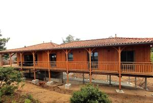 Maison en bois sur pilotis- 4218