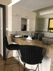 Charming one bedroom at wellivia suites