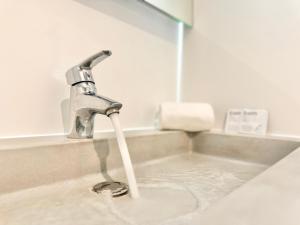 Appartements Entre deux Rives - Vue sur la Ville - Spacieux : photos des chambres