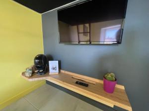 Appartements Studio du faubourg : photos des chambres