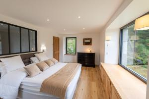 Maisons de vacances Le moulin de jeannou : photos des chambres