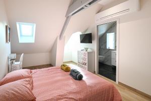 Maisons de vacances La Maison des Ours - proche plage de Courseulles : photos des chambres