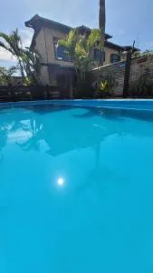 Pousada Uluwatu, Praia do Rosa - 普腊亚罗萨