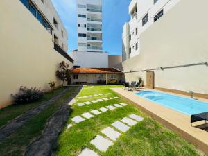 Casa de Praia com Piscina e Churrasqueira a 280m da Praia do Morro - 3 quartos com Ar Condicionado, sendo 2 suítes- Quintal amplo, ideal para famílias