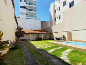 Casa de Praia com Piscina e Churrasqueira a 280m da Praia do Morro - 3 quartos com Ar Condicionado, sendo 2 suítes- Quintal amplo, ideal para famílias