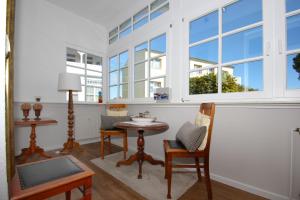 Villa mit Sonnenhof Ferienwohnung Gartenzauber mit kostenfreier Schwimmbadnutzung in Sellin