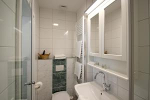 Villa mit Sonnenhof Ferienwohnung Gartenzauber mit kostenfreier Schwimmbadnutzung in Sellin