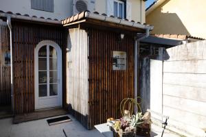 Appartements Maison COSY et CHALEUREUSE au centre ville : photos des chambres
