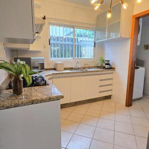 Casa com Jacuzzi em Bombas