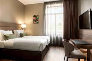 Superior Twin Room with City View room in AC Hotel by Marriott Mainz