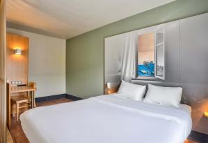 Hotels B&B HOTEL Saint-Witz : photos des chambres