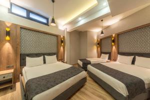 Executive Queen Room with Two Queen Beds - Basement Floor room in World Heritage Center Hotel