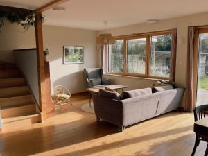 Maisons de vacances Maison en bois a la campagne proche vilaine : photos des chambres