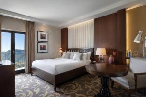 Balcony Deluxe King Room with View room in Renaissance Tuscany Il Ciocco Resort & Spa