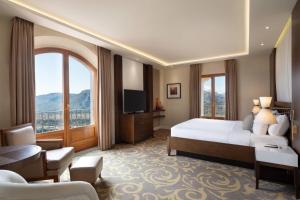 Balcony Deluxe Suite King Room with View room in Renaissance Tuscany Il Ciocco Resort & Spa