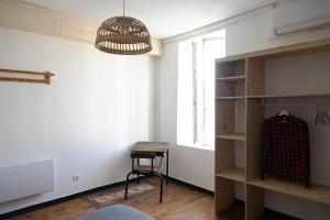 Appartements Maison COSY et CHALEUREUSE au centre ville : photos des chambres