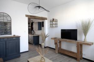 Maison COSY et CHALEUREUSE au centre ville