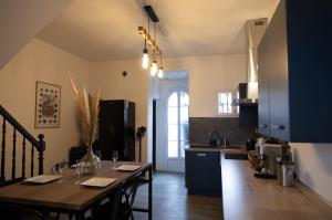 Appartements Maison COSY et CHALEUREUSE au centre ville : photos des chambres