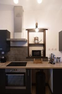 Appartements Maison COSY et CHALEUREUSE au centre ville : photos des chambres