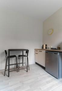 Residence Desroziers - Appartements design en centre ville : photos des chambres