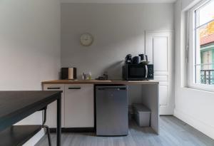Residence Desroziers - Appartements design en centre ville : photos des chambres