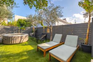 Hot Tub - 5 min to Beaches - Private Garden - Netflix