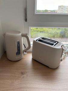 Appartements Studio cosy et apaisant : photos des chambres