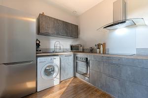 Appartements MAISON AMPERE : photos des chambres
