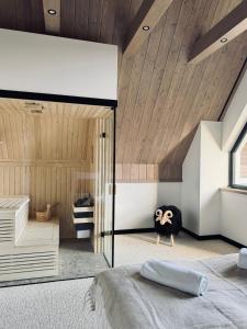 Osada Kaniówka - domki pod stokiem z sauna