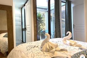 Villas The Garden House - Jardin Parking Hypercentre : photos des chambres