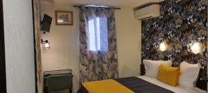 Hotels Hotel L'Etoile Aeroport - A61 : photos des chambres