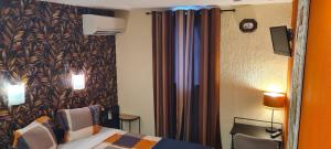 Hotels Hotel L'Etoile Aeroport - A61 : photos des chambres
