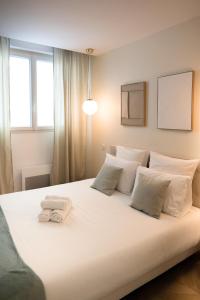 Appartements Le Lusso - L-elegance au coeur de Bergerac : photos des chambres