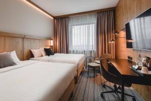 Superior Guest Room with Two Double Beds room in Courtyard by Marriott Warsaw Airport