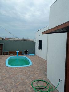 Casa em Capão com piscina