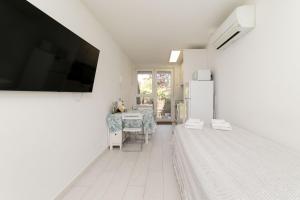 Apartamento con jardín privado