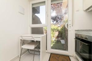 Apartamento con jardín privado