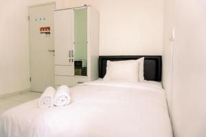 Simply Studio No Kitchen Apartment at 5th Floor Aeropolis Residence By Travelio