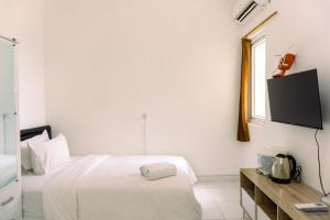 Simply Studio No Kitchen Apartment at 5th Floor Aeropolis Residence By Travelio