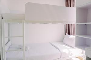 Scenic and Homey 2BR Apartment M-Town Residence near Mall By Travelio