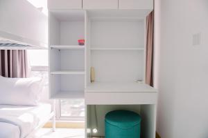 Scenic and Homey 2BR Apartment M-Town Residence near Mall By Travelio