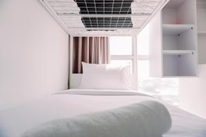 Scenic and Homey 2BR Apartment M-Town Residence near Mall By Travelio