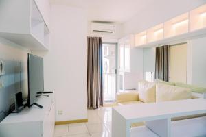 Scenic and Homey 2BR Apartment M-Town Residence near Mall By Travelio