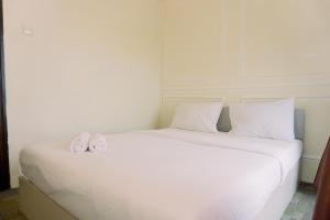 Nice and Homey 1BR at Serpong Greenview Apartment By Travelio