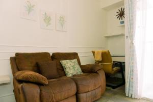 Nice and Homey 1BR at Serpong Greenview Apartment By Travelio