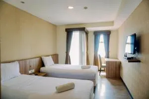 Cozy and Homey Studio Great Western Resort Apartment By Travelio - Pumpangsineng