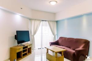 Elegant 2BR with Extra Room Apartment at Sudirman Tower Condominium By Travelio