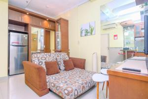 Fancy and Lavish 1BR at Menteng Square Apartment By Travelio