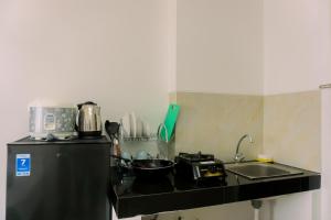 Studio with Comfortable Design at Serpong Garden Apartment By Travelio