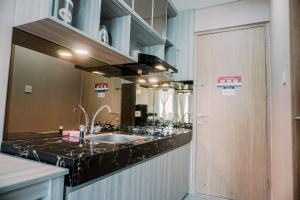 Simply and Comfortable Studio Apartment B Residence By Travelio